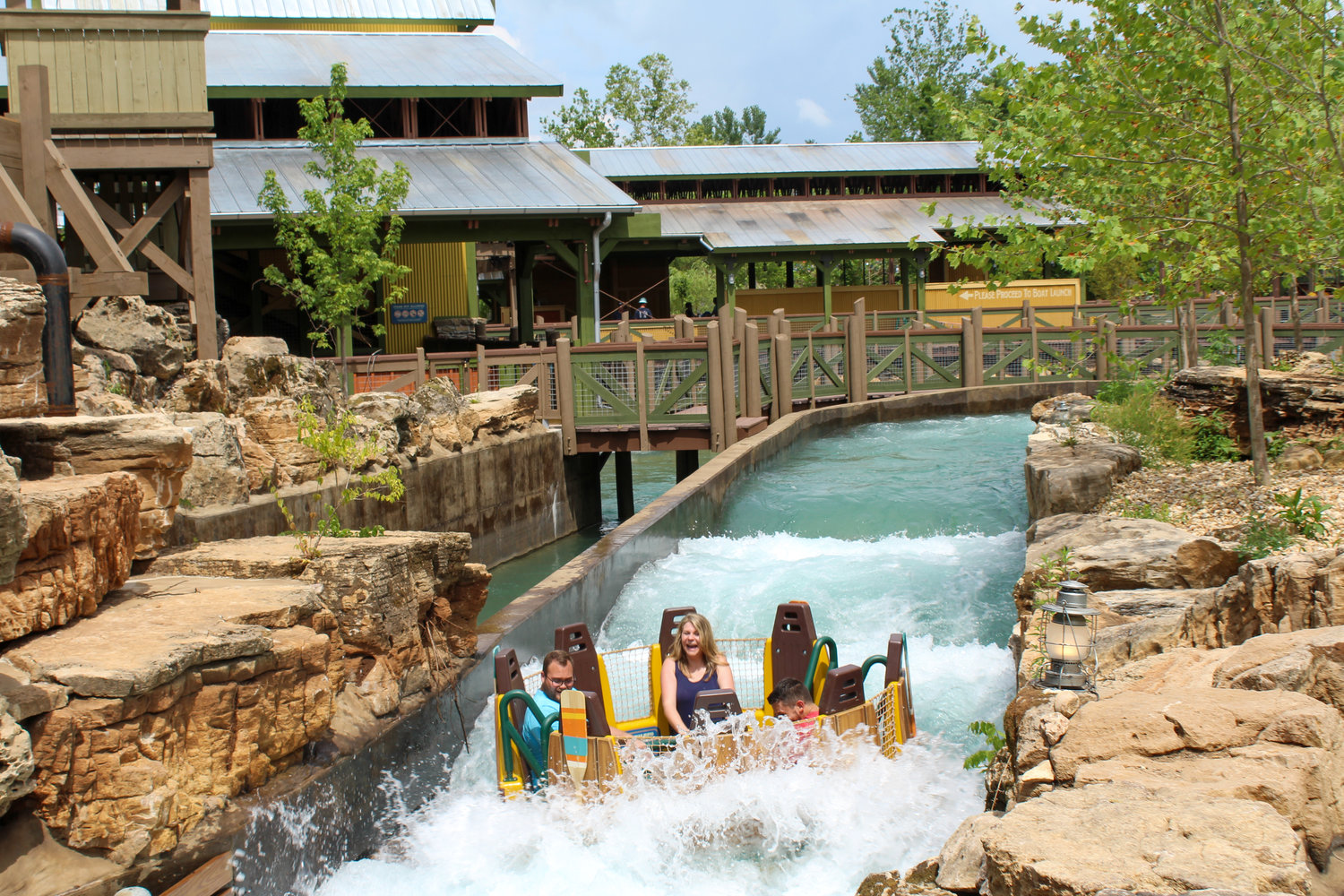 Guests test Mystic River Falls, Silver Dollar City's newest ride.